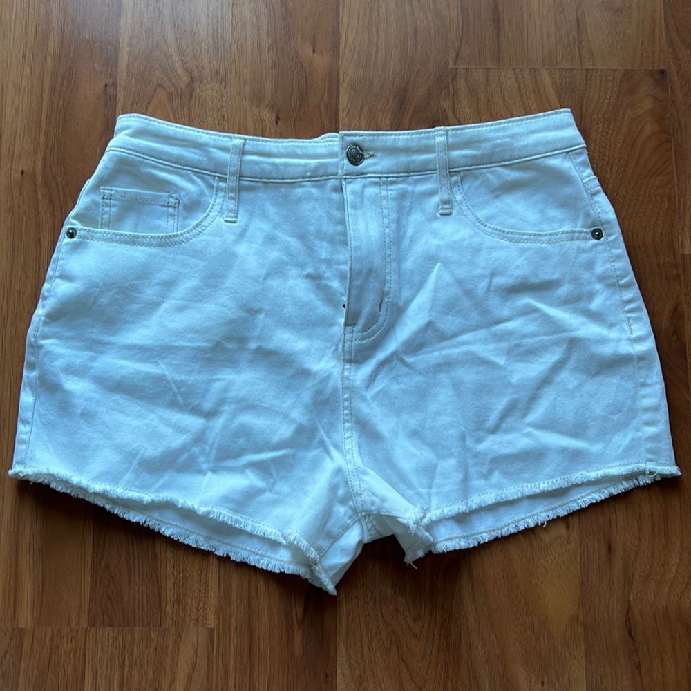 White universal thread cut off shorts.